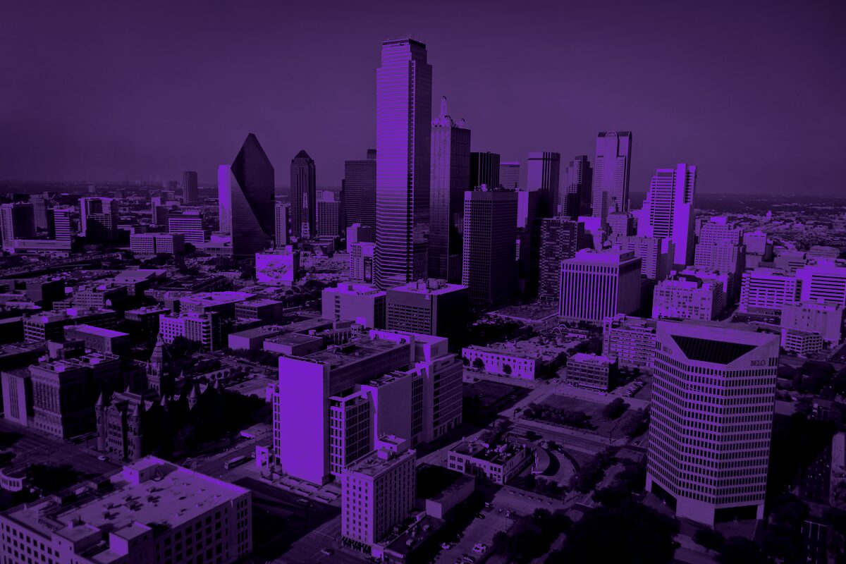 The Dallas skyline rendered in deep royal purple, the metroplex Innovate Insight Marketing serves